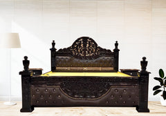 Black carved wooden bed